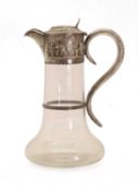 A silver mounted cut glass claret jug,