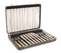 A cased set of silver flatware,
