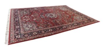 A large contemporary wool Persian rug,
