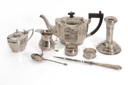 A collection of silver table items,