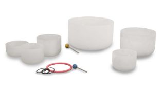Six frosted quartz sound bath singing bowls,