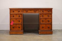 An oak pedestal desk, circa 1900,