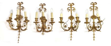 A set of four gilt metal wall appliques, 20th century, French,