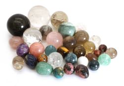 A collection of semi precious polished stone spheres
