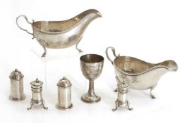 A pair of silver sauceboats,