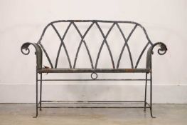 A painted wrought iron style bench, 20th century,