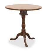 A George III mahogany tilt top wine table, 19th century,