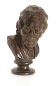 After Jean-Antoine Houdon A bronze bust of Voltaire,
