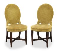 A pair of green velvet dining chairs, late 19th century,