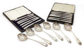 A set of six silver soup spoons,