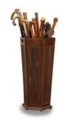 A wicker umbrella stand, 19th century and later,
