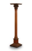 A fruitwood and oak column torchere, late 19th century,