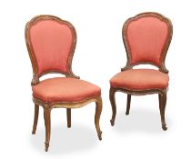 A pair of rosewood show wood upholstered salon chairs, 19th century,