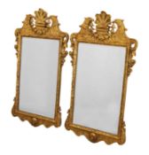 A pair of Regency style gilt wall mirrors,