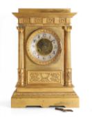 A gilt brass mantle clock, 19th century,