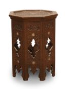 An octagonal carved hardwood occasional table, late 19th/early 20th century, Syrian,