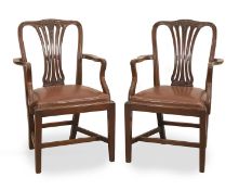 A pair of mahogany elbow chairs, 19th century,