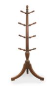 A mahogany coat rack,