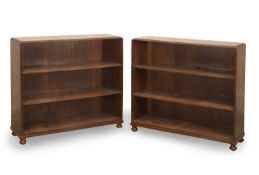 A pair of teak open bookcases, early 20th century,