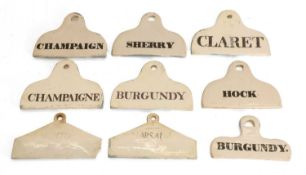 A collection of ceramics barrel labels, 19th century and later,