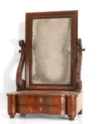 A Biedermeier-style flame mahogany dressing mirror mid 19th century,