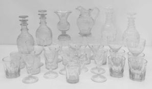A collection of decanters and glasses,