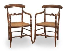 A pair of late Victorian simulated rosewood carver armchairs, 20th century,