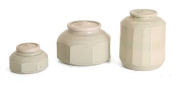 John Wheeldon (b.1950) Three covered stoneware celadon jars