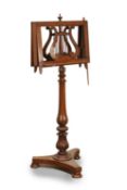 A Victorian rosewood duet music stand, early 20th century,