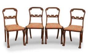 A set of four Regency rosewood dining chairs, 19th century,
