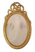 An oval gilt wall mirror, mid 19th century,
