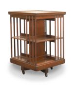 An Edwardian walnut revolving bookcase, 20th century,