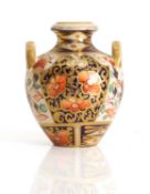 A Crown Derby urn,