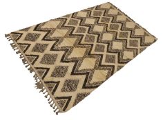 A Berber style wool rug,