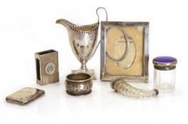 A collection of silver items,