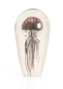 A modern glass paperweight, of modern manufacture,