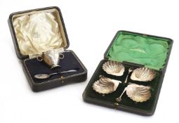 A silver set of four silver salts and spoons,