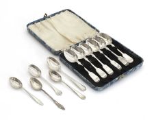 A collection of silver spoons,
