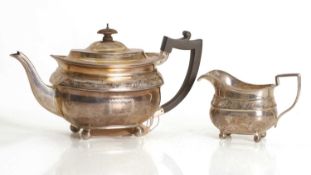 A silver teapot,