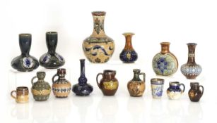 A collection of miniature stoneware items,