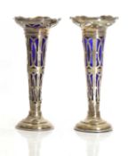 A pair of Art Deco silver bud vases,