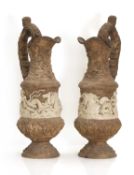 A pair of Renaissance-style terracotta ewers