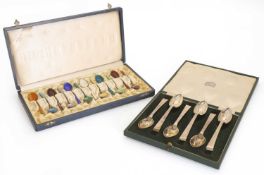 A cased set of twelve enamelled teaspoons,