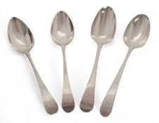A collection of four silver spoons,