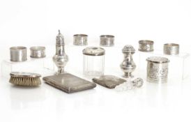 A collection of silver table items,