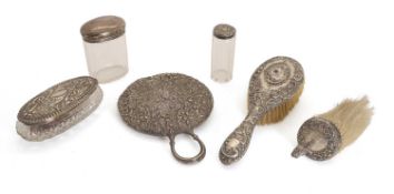 A collection of silver dressing table items,