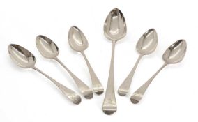 A collection of silver spoons,