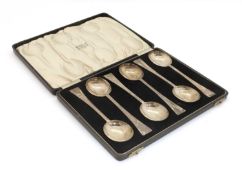 A cased set of six silver soup spoons,