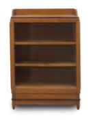 A Dutch Art Deco style teak and ebonised open bookcase, mid 20th century,