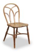 An elm hoop back Windsor chair, second quarter 19th century,